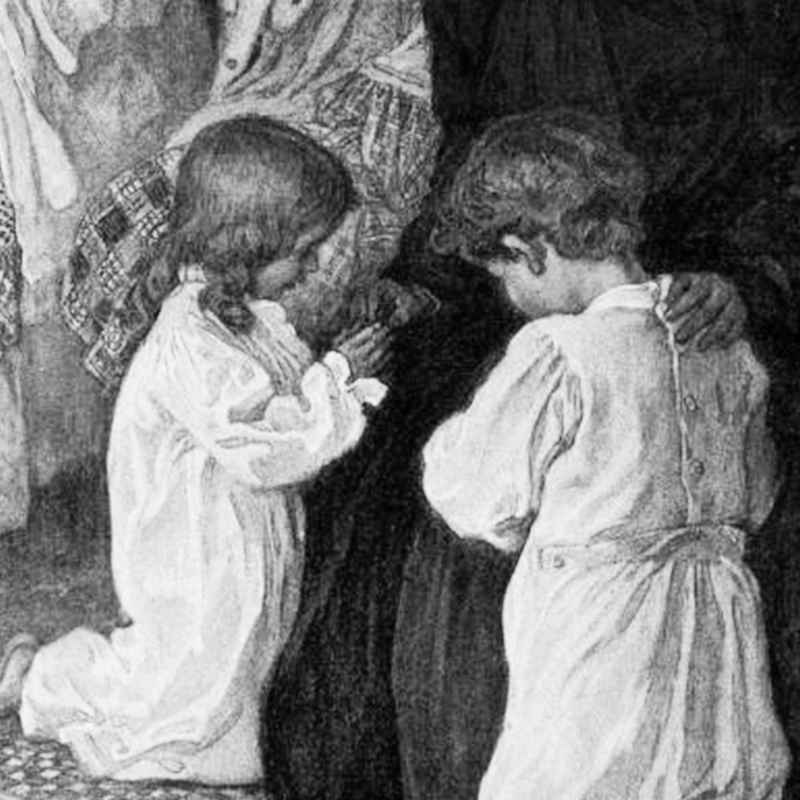 Two children on their knees praying