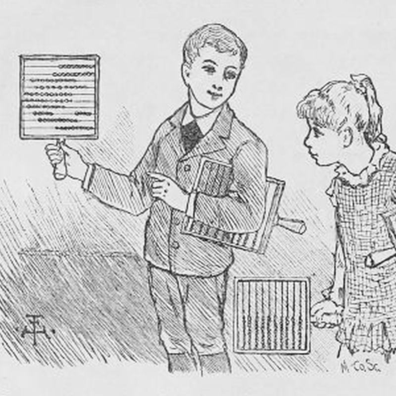 A boy holding up an Abacus to show to the girl next to him